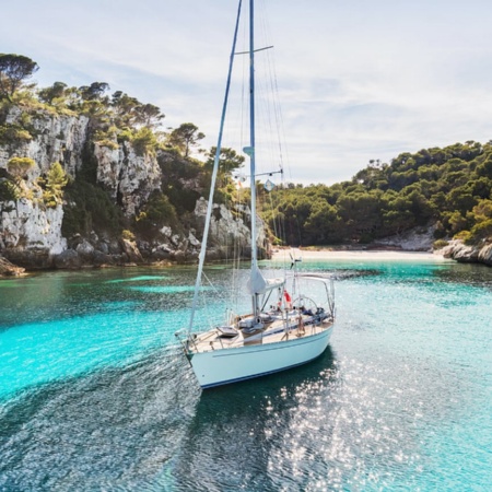Sailing boat in Cala Macarelleta, Menorca, Balearic Islands