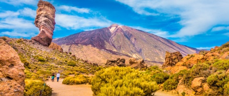 People walking through the Teide National Park in the Canary Islands