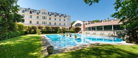  Outside view of the gardens and swimming pool at Castilla Termal Balneario de Solares spa, Cantabria