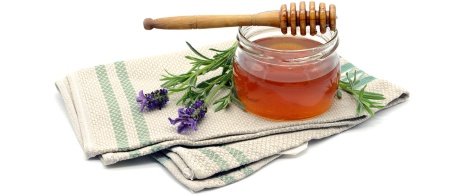 Банка меда с цветами лаванды Банка меда с цветами лаванды
