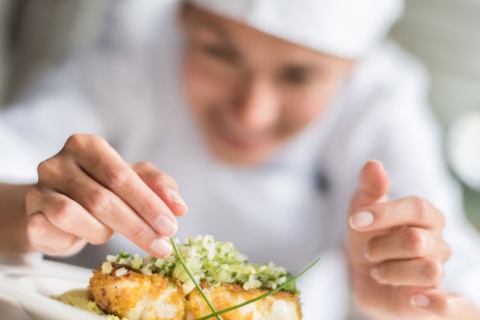 Chef plating food