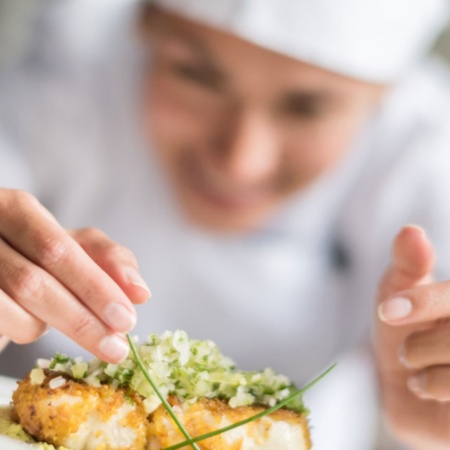 Chef plating food