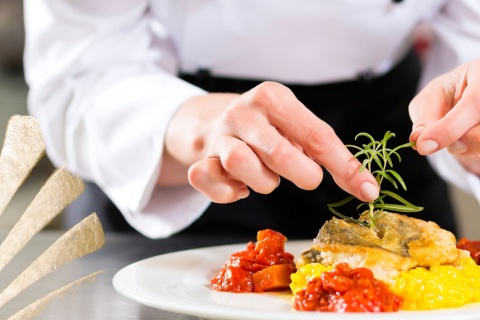 Chef plating food