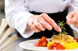 Chef plating food