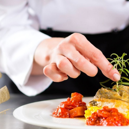 Chef plating food