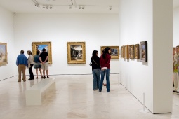 Room with visitors inside the museum