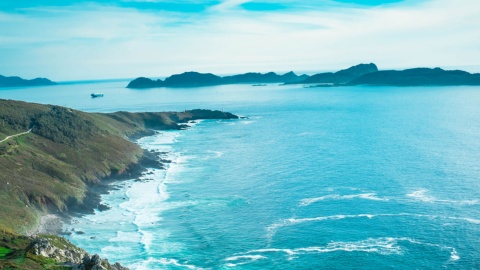 Natural area of the Costa da Vela with the Cíes Islands in the background